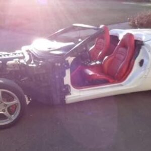2000 C5 Corvette Convertible with 104k miles.