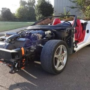 2000 C5 Corvette Convertible with 104k miles.