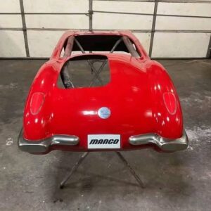 A restored Manco corvette go cart body