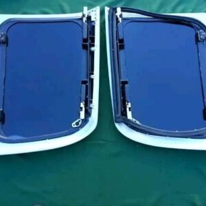 This is an NOS set of Michaelis Moonroofs still in their original packaging