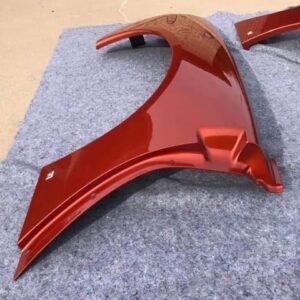 Daytona Sunset Orange Metallic rear fender quarter panels for a c6 corvette