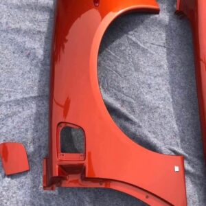 Daytona Sunset Orange Metallic rear fender quarter panels for a c6 corvette