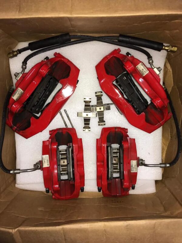 All 4 of the OEM Brembo Red Brake Calipers, with Stock Brake lines, Stock Rotors and Pads with 4100 miles on them - Image 6
